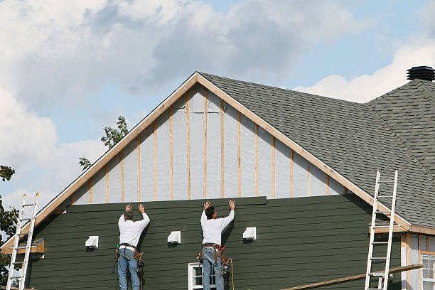 Professional Siding Contractor technician working in Brecksville, OH